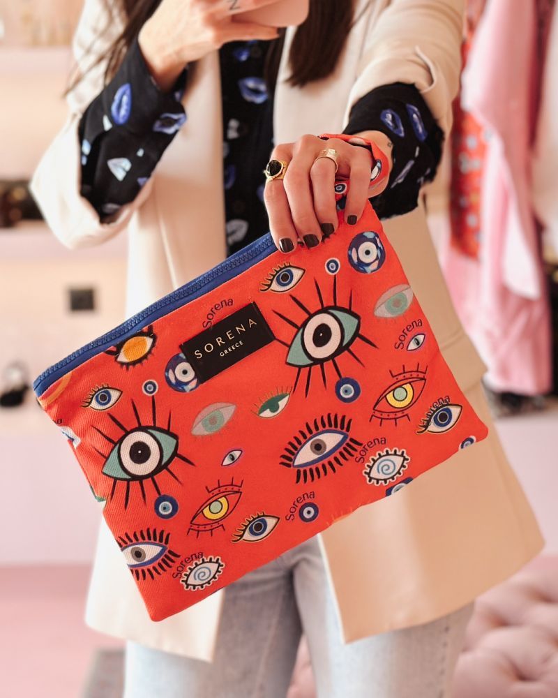 Φωτογραφία από Lucky clutch eyes orange